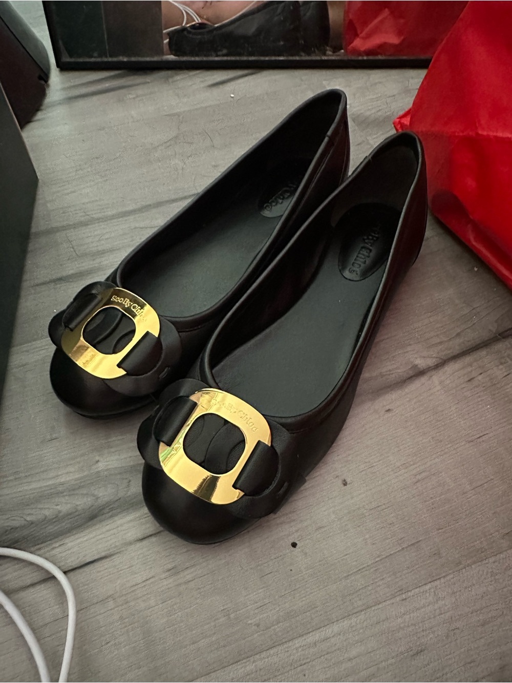 See By Chloe Black Flats with Gold Logo Medallions